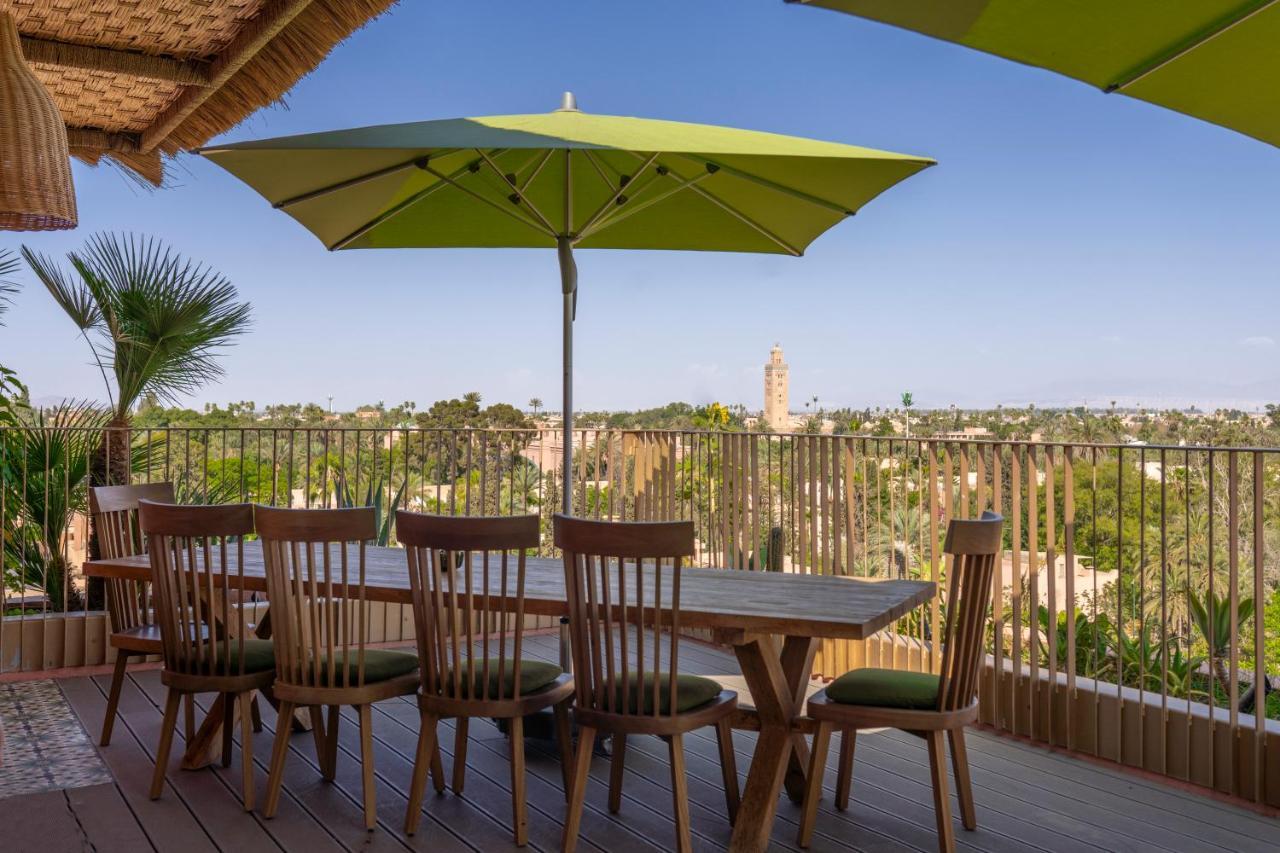 Hotel Jadali & Spa Marakeş Dış mekan fotoğraf A patio umbrella